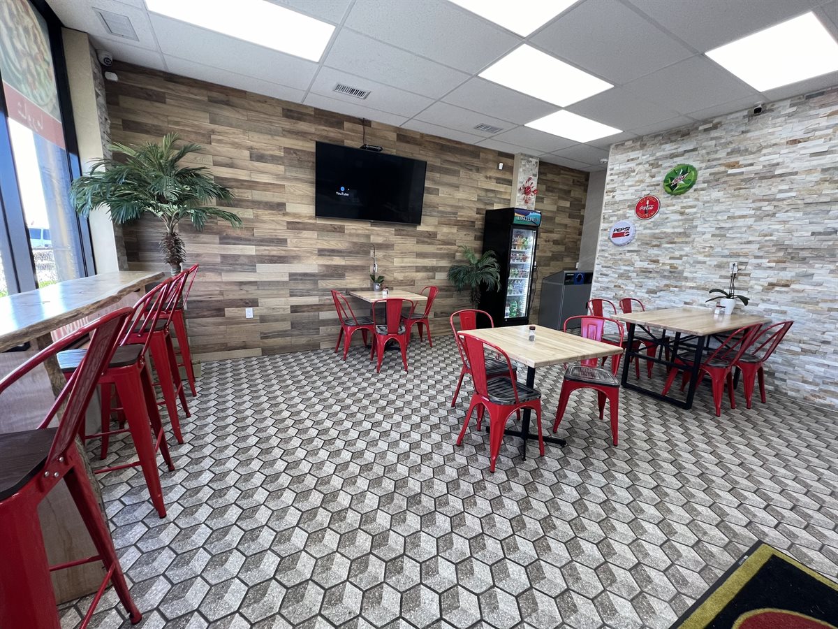 Swan Grill & Bakery مطعم وأفران الوزة